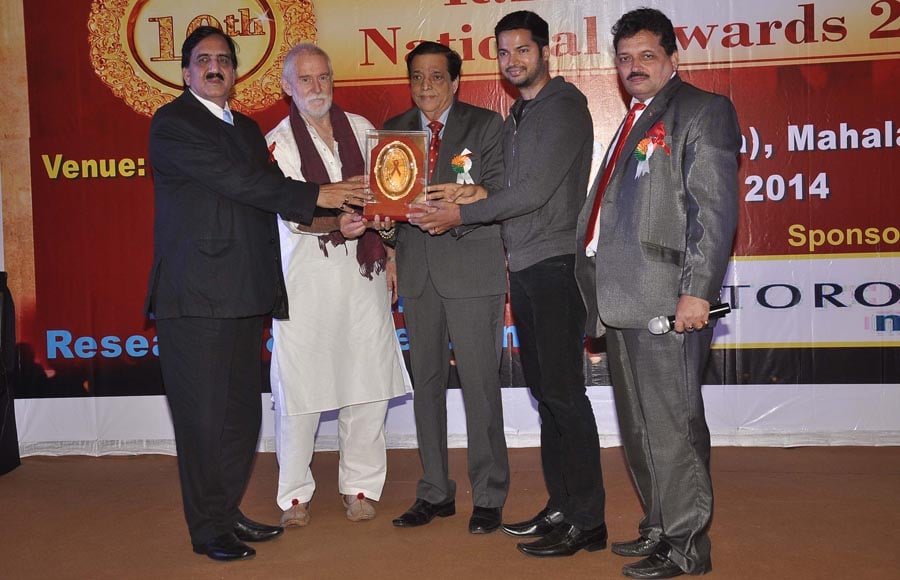 Prashantt Guptha receiving '10th Excellence National Best Debutante Awards 2014'