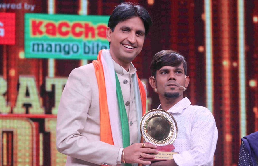 Mahatma Gandhi's grandson Tushar and Kumar Vishwas in Sa Re Ga Ma Pa Li'l Champs