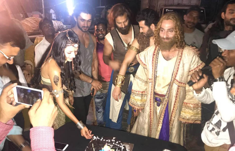 Porus team calls for a celebration on hitting a century!