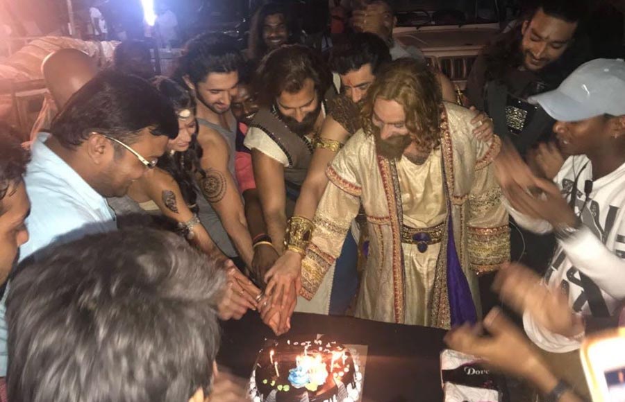 Porus team calls for a celebration on hitting a century!