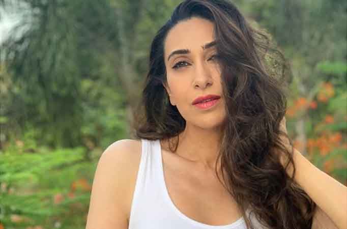 Karisma shares throwback video of parents 'romancing in rain'   