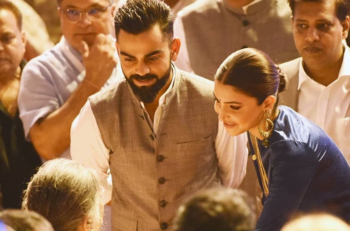 Anushka Sharma holds and kisses Virat Kohli's hand at mention of his late father; the video will melt your heart 