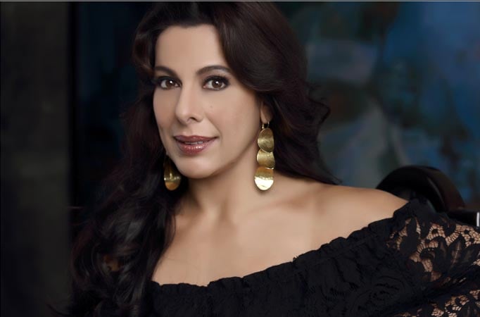 Actress Pooja Bedi participates in Mahindra Open Drive to raise funds for water wheels 