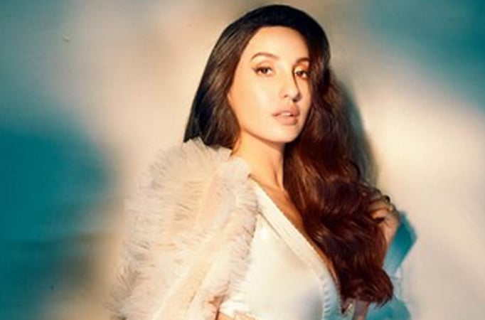 Nora Fatehi gets trolled for wearing an overcoat and gloves; netizens say, “Mumbai is heating up and this women has worn so many