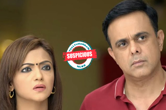 Rajesh spies on Vandana