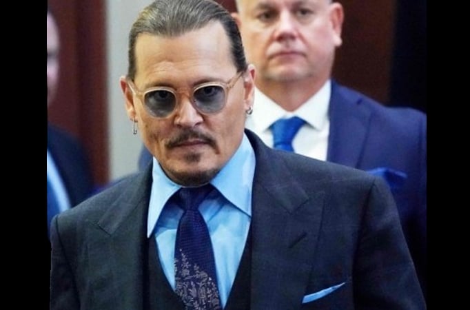 Lawyer to lover: Depp said to be dating his defendant