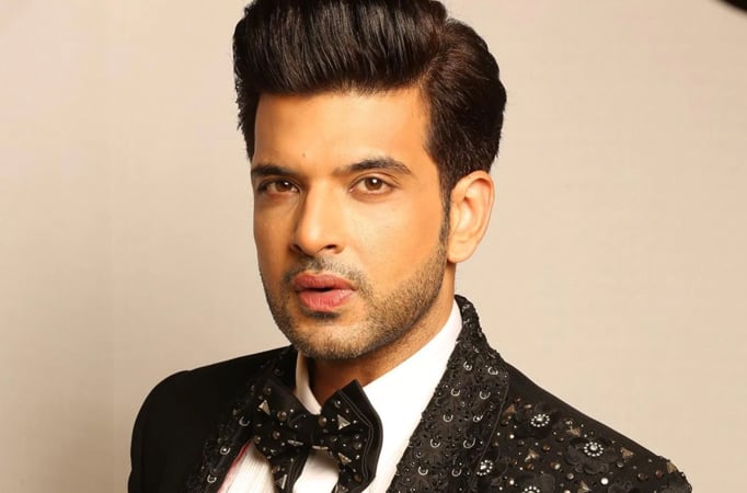 Karan Kundrra asks the media to pause during a press conference; netizens praise the actor for showing respect, say “Dil jeet li