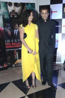 Chetan Bhagat with his wife