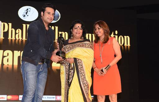 Krushna Abhishek awarding Sohani Hossain
