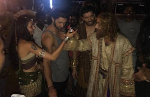 Porus team calls for a celebration on hitting a century!